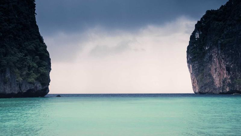 Comprehensive Guide to Airline Credit Cards for 2025 Travelers 1 Traveler holding a boarding pass at the airport