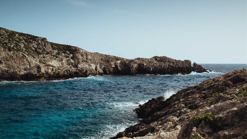 How to Build Credit Fast in 2026 with the Right Credit Card 1 Person holding credit cards and smiling