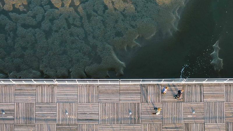 Calculator and notebook showing debt payoff plans